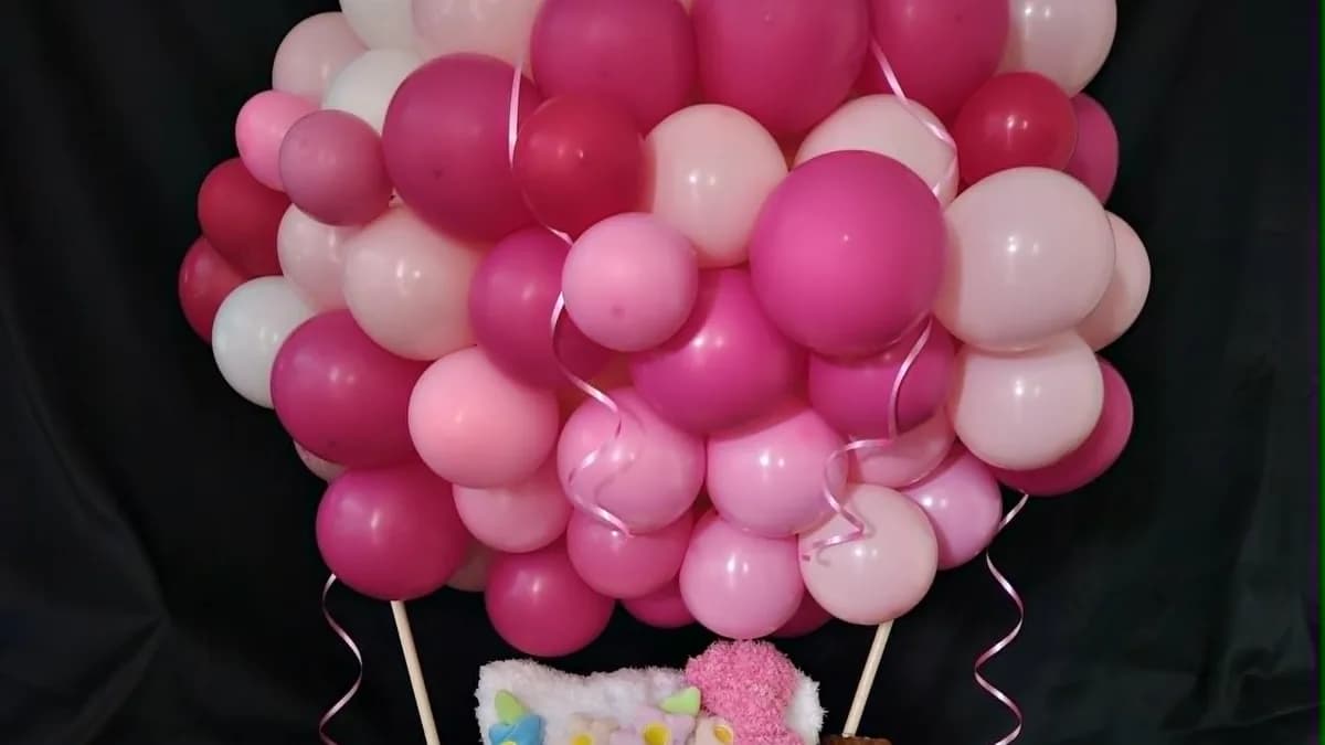 Pink Hello Kitty balloon basket arrangement