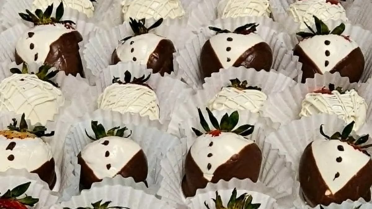 Chocolate-covered strawberries decorated in white and dark chocolate